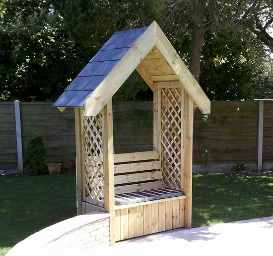 hand built arbour with slate roof