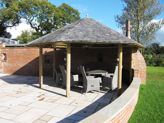 open summerhouse, gazebo-style with fire place, oven and chimney