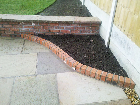 border brick edging with patio, artistic design