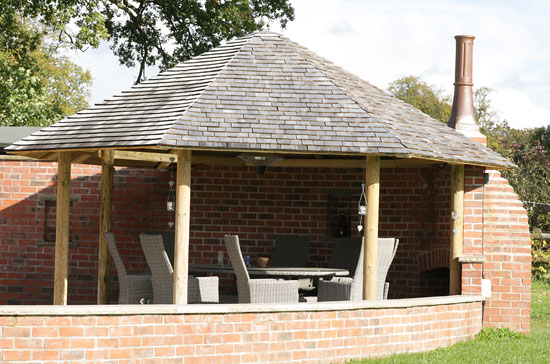side view of open summerhouse with curved wall